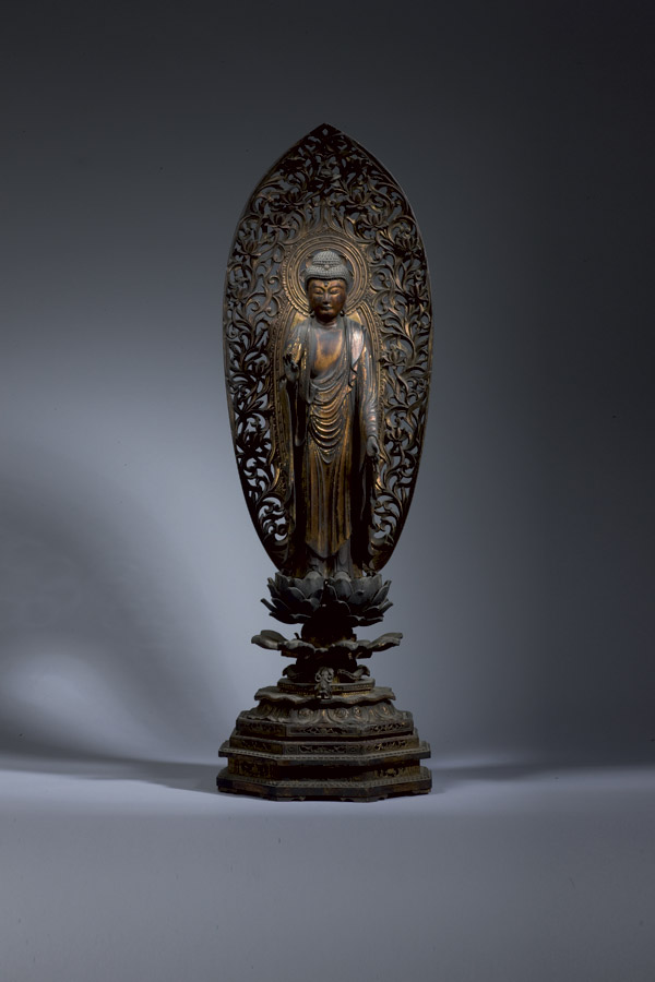 A gilt wood figure of a standing Amida Nyorai