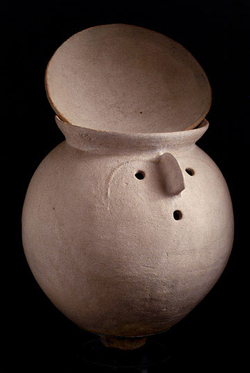 Neolithic Burial Urn With Abstract Human Face