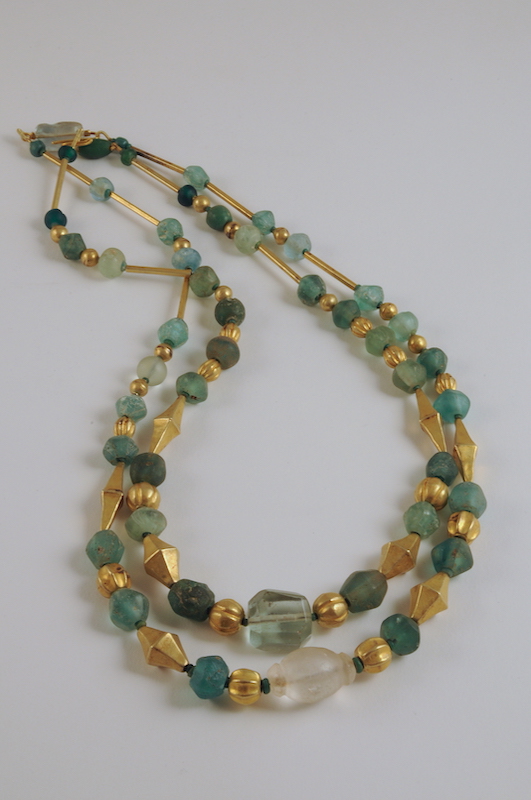 Gold elements and glass beads necklaces