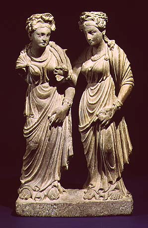 Two Standing Females