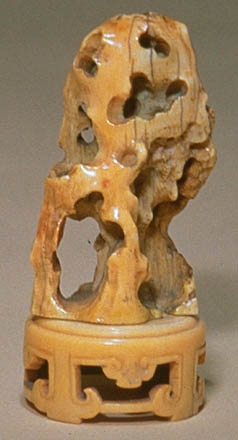 7. Miniature rock-form carving