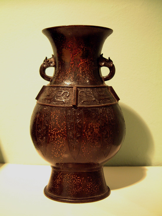 A patinated Chinese bronze vase, 12th-14th century