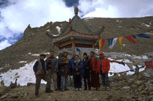 1996 Art Conservation Field Team stopping at Qiao'er Shan on the way  to Dege. (L to R) Pamela Logan, Denba Daji, Donatella Zari, Carlo Giantomassi, Guido R Botticelli, Yang Jin, Wu Bangfu, Gonga, Yuan Xiaowen.