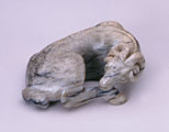 Chinese figure of a reclining Ibex