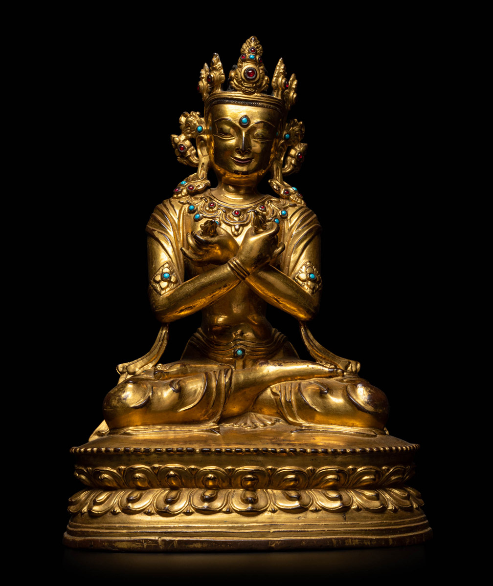 A gilt-bronze figure of Vajradhara