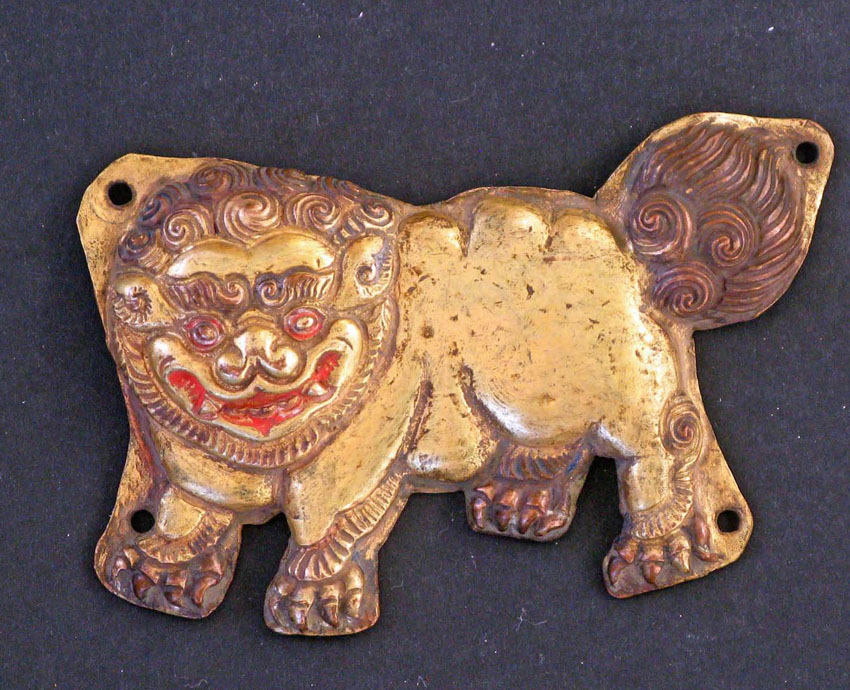 Embossed gilt copper plate, representing a Snow Lion