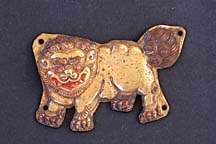 Embossed gilt copper plate, representing a Snow Lion