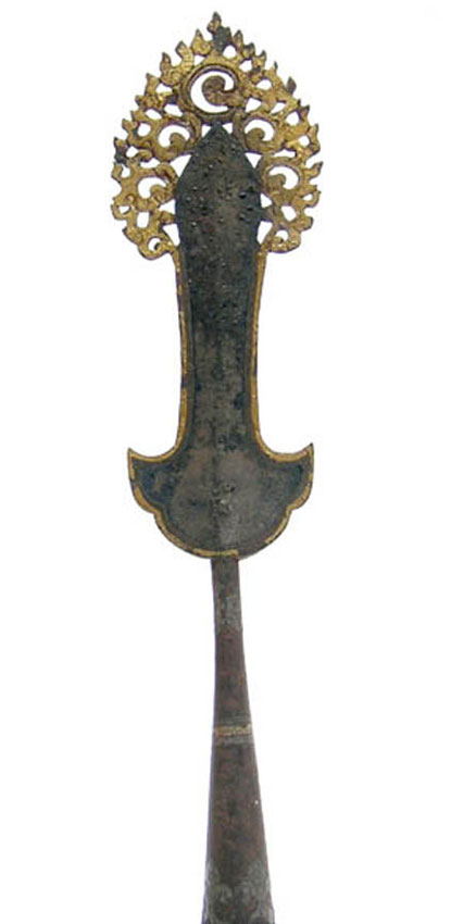 A Tibetan parcel gilt and silver inlaid iron staff finial for ritual use